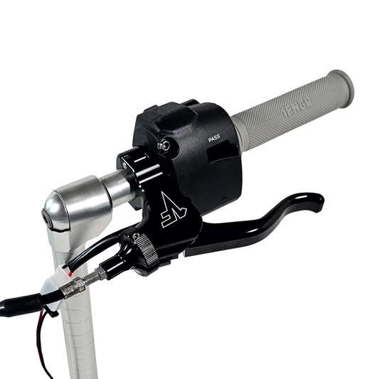 A black easy pull clutch lever for a motorcycle, featuring a lever, perch, and clamp, mounted and neutral safety switch on a handlebar.